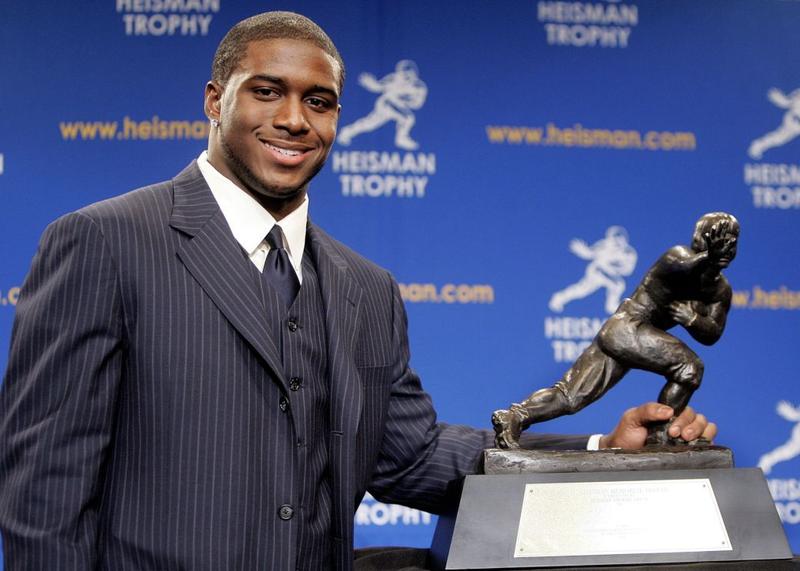 Running back Reggie Bush poses with the 2005 Heisman trophy after winning the award at the 71st Annual Heisman Ceremony on December 10, 2005 in New York City.
